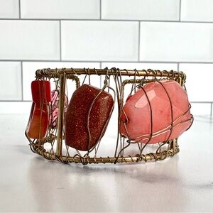 Cuff bracelet with twisted wire and beads.